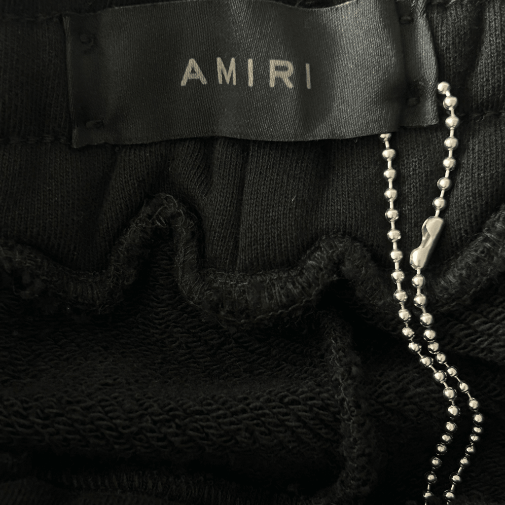 Amiri Black & White Checkered Bones Sweatpants - Morely TrendsAmiri Type here:)