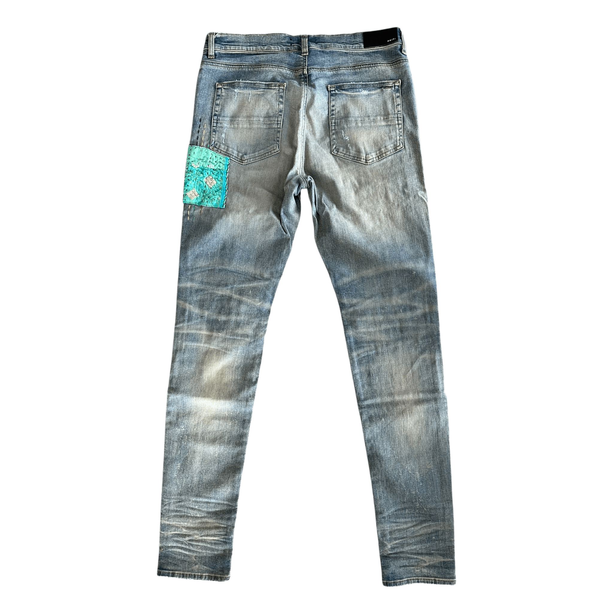 Amiri Clay Indigo Quilted Patch Jeans - Morely TrendsAmiri Type here:)