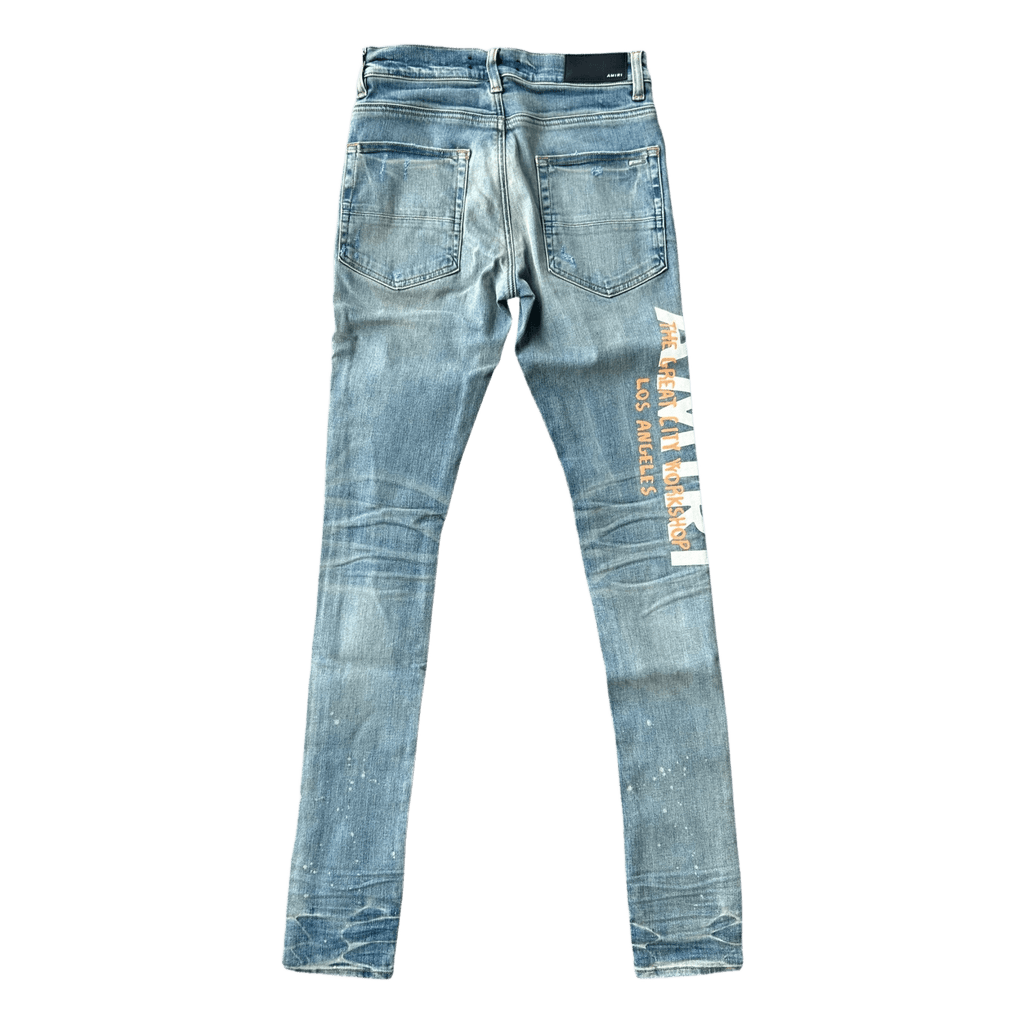 Amiri Clay Indigo T.G.C.W Distressed Logo Jeans - Morely TrendsAmiri Type here:)