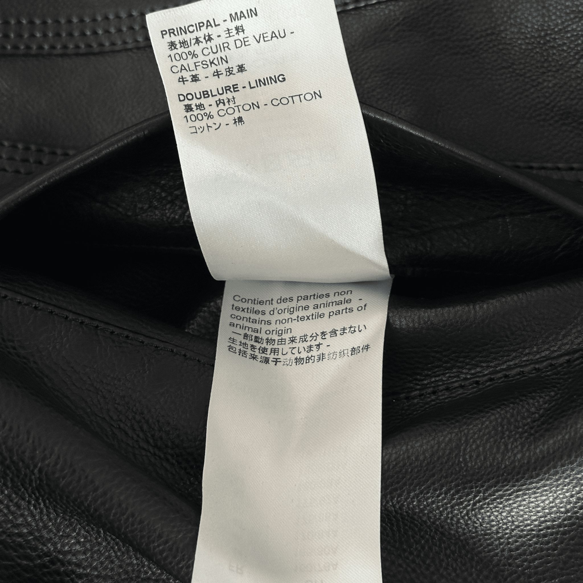 Louis Vuitton Black & White Chain Leather Trucker Jacket - Morely TrendsLouis Vuitton Type here:)